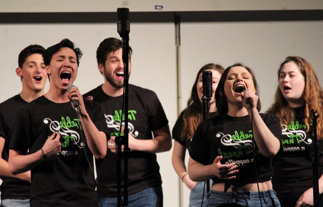 students singing in acappella group